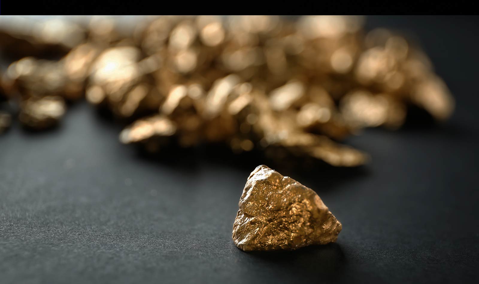 Gold Plummets $30, Hardy Feller Banks Massively